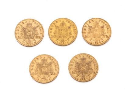 null Lot en or 750 millièmes, composé de:
3 pièces de 20 francs français datées 1864,...