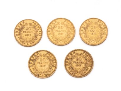 null Lot in 750 thousandths gold, consisting of:
5 French 20 franc coins dated 1857,...