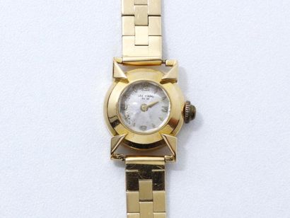 null Montre bracelet de dame

en or 750 millièmes, cadran argenté avec chiffres arabes...