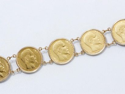 Bracelet Bracelet en or 750 millièmes, retenant 7 pièces de 20 francs à l'effigie...