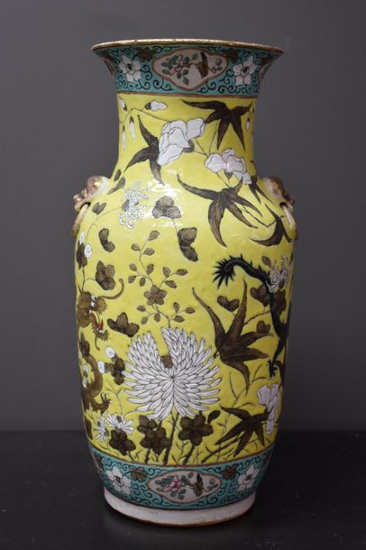 null CHINESE PORCELAIN VASE ON A YELLOW BACKGROUND WITH A PHOENIX DECOR. THREADS...