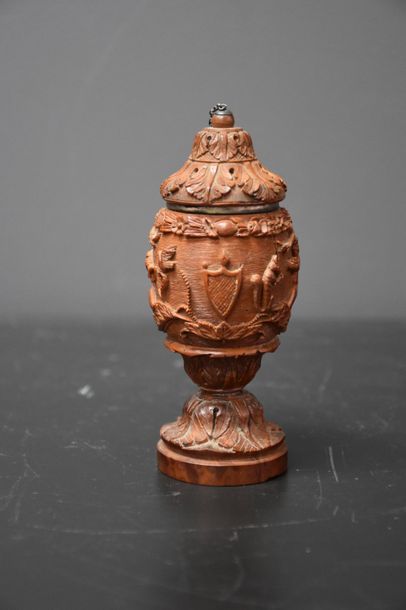 null MUSTARD POT BEGINNING 19TH CENTURY IN COROZO NUT WITH SCULPTED ANGEL AND BESTIAIRE...