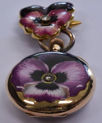 null Watch and its 14 k gold flower and enamel brooch.
