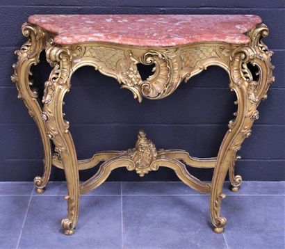 Rococo style console in gilded wood. Ht 92...