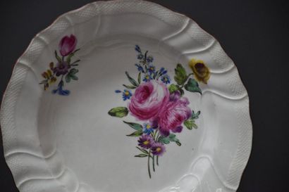 null Soup plate in polychrome Tournai porcelain with floral decoration, 18th century,...