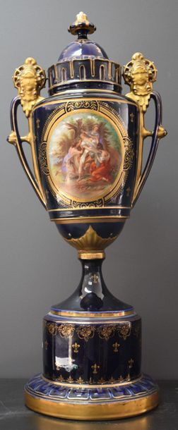 null Blue and gold porcelain vase around 1900 with animated mythological decor. Ht...