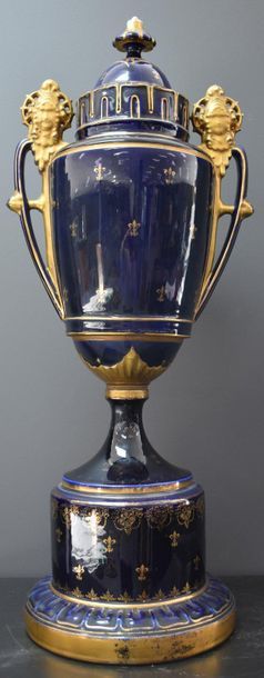 null Blue and gold porcelain vase around 1900 with animated mythological decor. Ht...