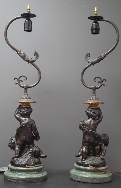 null Pair of puttis bronzes, French work from the Napoleon III period, later mounted...