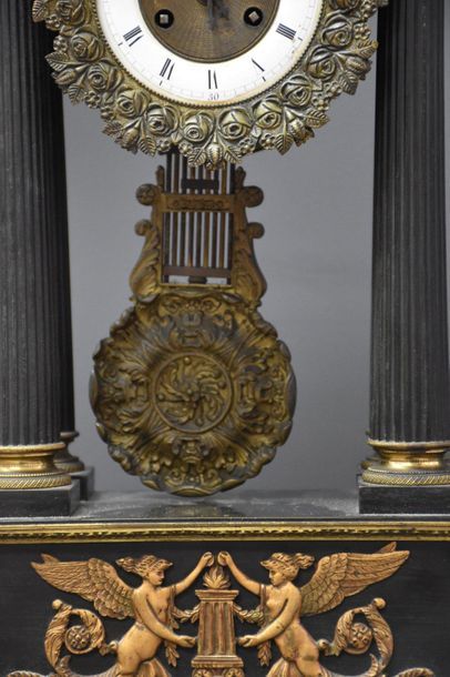 null Bronze decoration from the Maison Luppens, composed of a portico pendulum and...