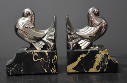 Pair of art deco bookends in silvered bronze...