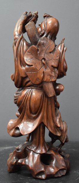null Series of 4 Chinese carved wooden immortals around 1900 from 33 to 40 cm.