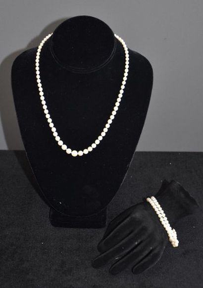 Bracelet + pearl necklace and 18 k gold.