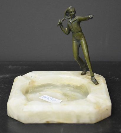 null Art deco ashtray with bronze tennis player. Ht 13 cm.