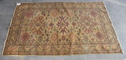 null Carpet with geometric decoration, beige background. Carries a MASOGLU manufacturer's...