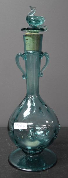 null Set of 2 green blown glass decanters circa 1900. Ht 33 and 15 cm.