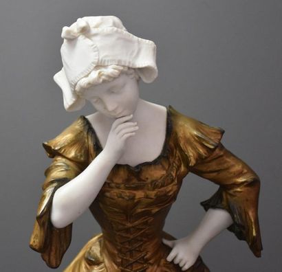 null Sculpture in white biscuit and golden regulator. "Young woman with an upside-down...