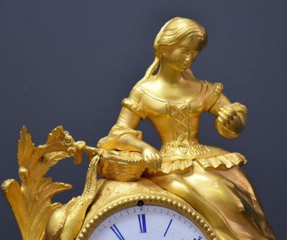 null 1 Clock in gilt bronze representing a romantic scene. Ht 40 cm .