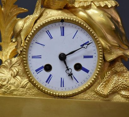 null 1 Clock in gilt bronze representing a romantic scene. Ht 40 cm .
