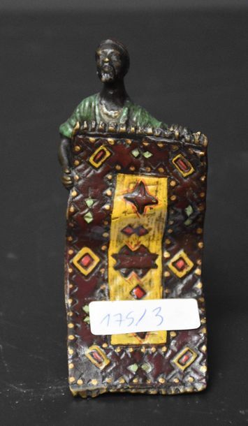 null Bronze of Vienna. "Carpet merchant." Marked "Vienna." Ht 9 cm .