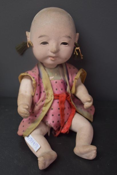 null A.M. Germany doll, Chinese baby, bisque head (missing 1 finger) and a boiled...