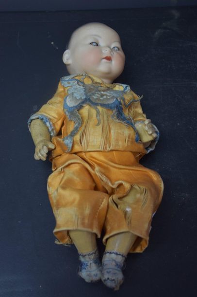 null A.M. Germany doll, Chinese baby, bisque head (missing 1 finger) and a boiled...