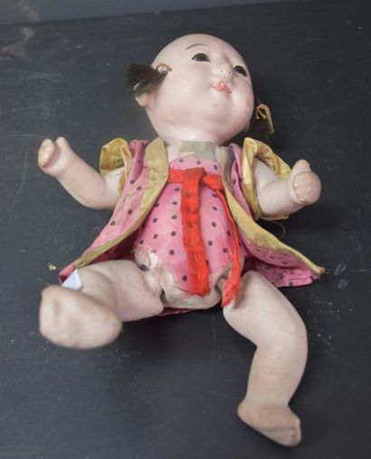 null A.M. Germany doll, Chinese baby, bisque head (missing 1 finger) and a boiled...