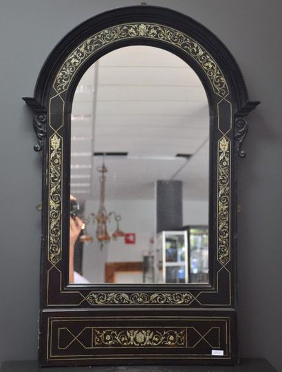 null 19th century mirror in blackened wood with ivory inlays of masks and foliage....