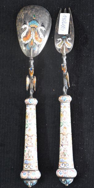 null Pair of cutlery (fork and spoon) decorated with sea dragons in painted enamel...