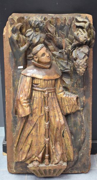 null High relief in carved and polychromed wood representing a monk. Late 16th, early...