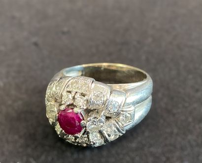 null 18 k white gold ring set with a 0.25 k ruby and surrounded by diamonds . Weight...