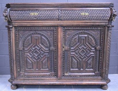 null Renaissance period low furniture in carved oak, two doors and two drawers, cut...