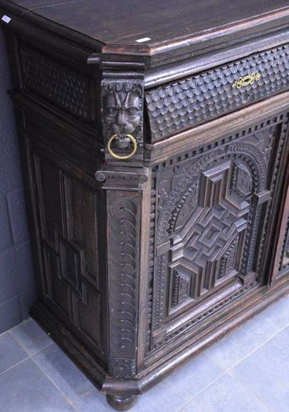 null Renaissance period low furniture in carved oak, two doors and two drawers, cut...