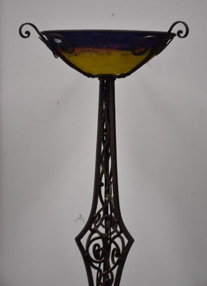 null Wrought iron art deco floor lamp topped by a glass paste bowl signed Muller...
