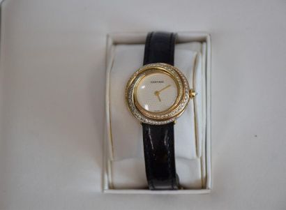 null Cartier watch model Trinity sold with box and original documents.