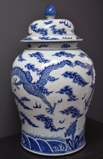 null Covered porcelain vase with white / blue decoration of dragons chasing the sacred...