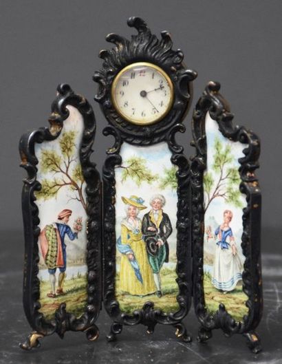 null Miniature screen with bronze pendulum and painted enamel plates. Ht 11 cm .