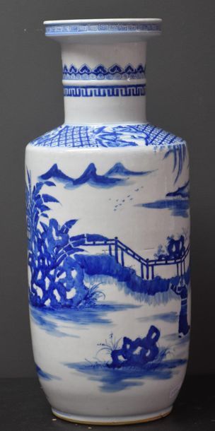 null Chinese porcelain scroll vase, court scenes in blue on a white background. Bears...