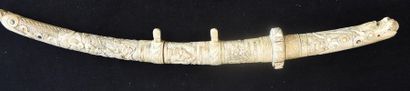 null Carved ivory katana decorated with mother-of-pearl cabochons. Japan 19th century...