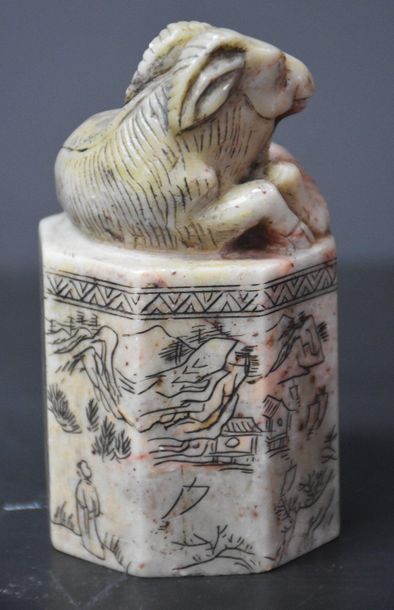 null Chinese octagonal seal in hard stone surmounted by a goat and a hare decoration...