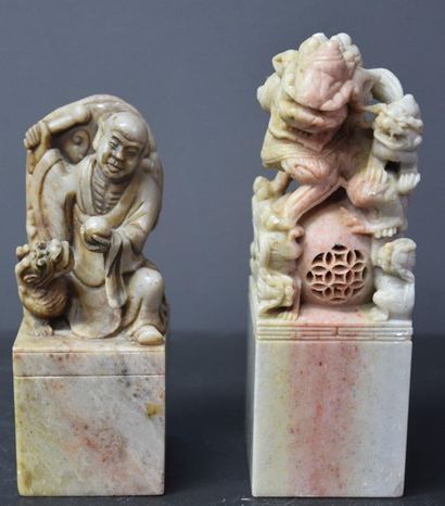 null Set of 2 Chinese hard stone seals with dog and dragon characters. Ht 14 and...
