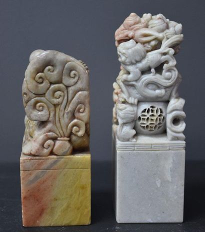 null Set of 2 Chinese hard stone seals with dog and dragon characters. Ht 14 and...
