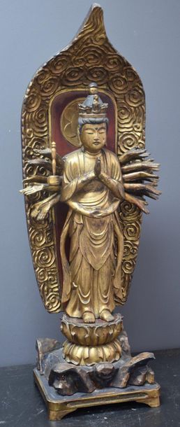 null Divinity on lotus flowers in carved and gilded wood . Japan. 19th century. Ht...
