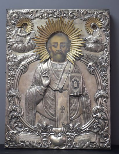 null An important Romanian icon covered with carved and chiselled silver. Dated April...