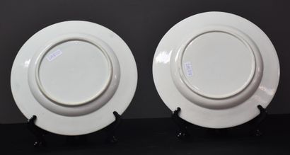 null Two Tournai porcelain plates decorated with shooting prizes .