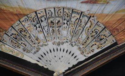 null 18th century fan with ivory handle carved and engraved with characters .

Wallpaper...