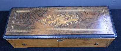 null Napoleon III period music box. Inlaid lid. Length 59 cm. Height 15 cm.