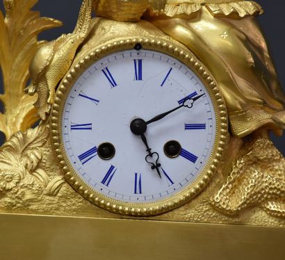 null Clock in gilt bronze representing a romantic scene. Ht 40 cm .