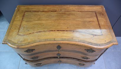 null 18th century German crossbow style curved chest of drawers in oak and walnut...