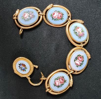 null Bracelet made of 6 painted opaline medallions. One of them opens and acts as...