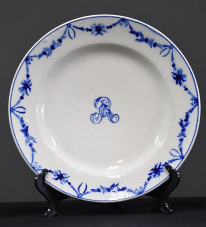 null Set of 4 Tournai porcelain plates with central monogram decoration.